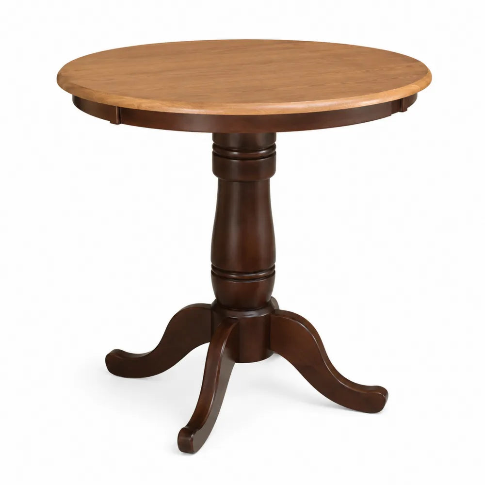 Table ronde en bois brun avec plateau en chêne